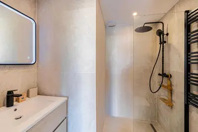 a bathroom with a shower and a sink at Harmony with private terrace - near Croisette in Cannes