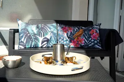 a table with a tea kettle on top of it at Cannes Studio near Croisette Plage in Cannes