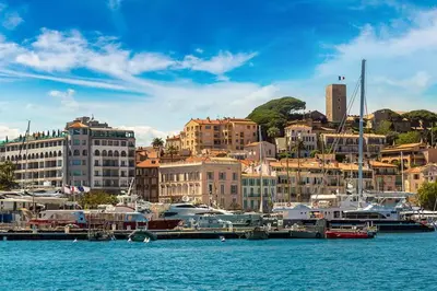 a group of boats docked at a marina in a city at Studio Cannes centre in Cannes