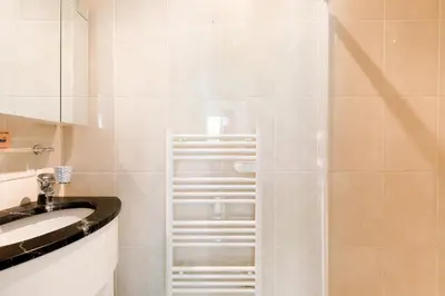 a bathroom with a shower and a sink at Cristal Croisette YourHostHelper in Cannes