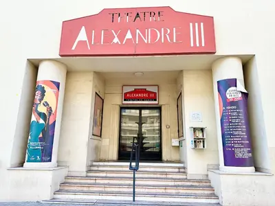 a building with a sign that reads theatre alevantine iii at Alexendre 3 Elégant Studio Centre Cannes proche Palais des festivals in Cannes