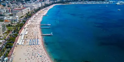 an aerial view of a beach with people and the water at Alexendre 3 Elégant Studio Centre Cannes proche Palais des festivals in Cannes