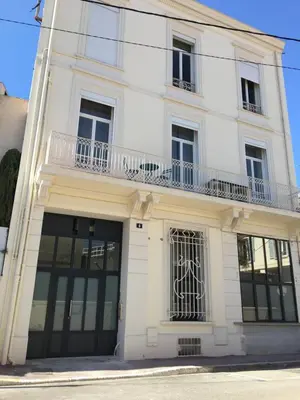 a white building with windows and a balcony at BRP Cannes Center, Top floor Luxurious Apartment II, 4 bedrooms+3 bathrooms in Cannes