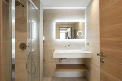 a bathroom with a sink and a shower at Luxury Romantic Cannes 45 Croisette Two Bedrooms in Cannes