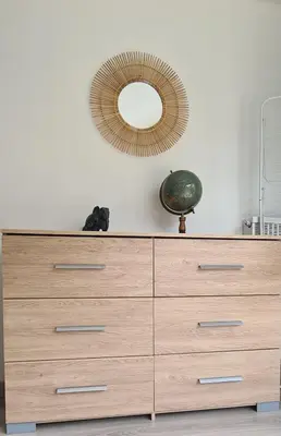 a dresser with a mirror on top of it at Le Ptit Ecrin du Lerins in Cannes