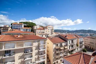 a view of a city with buildings at Brand New Central Cannes Apt 2 min walk to Palais in Cannes