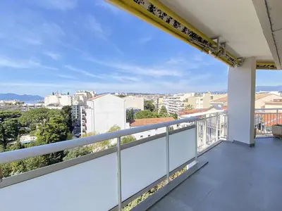 a balcony with a view of the city at Cannes proche Croisette - Appartement 3 Pièces vue mer terrasse Helv7 in Cannes
