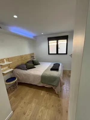 a bedroom with a bed and a blue light at Havre de Paix avec Villa Prestige Cannes Luxe, Piscine Chauffée, Alarme, Caméras Parking privée in Le Cannet
