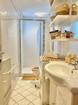 a bathroom with a toilet and a sink and a shower at Cannes appartement 1 chambre - Victoriam in Cannes