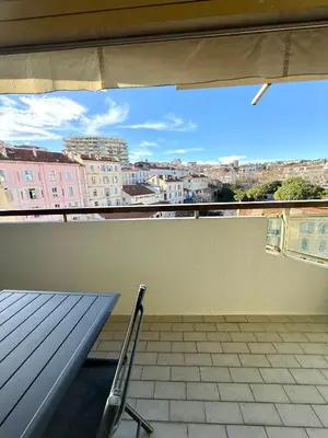 a balcony with a view of a city at T2 avec terrasse, Gare Cannes & Croisette à pied in Cannes