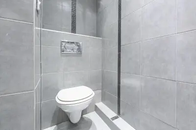 a bathroom with a toilet and a shower at Rooftop la Croisette in Cannes