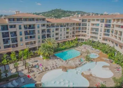an aerial view of a resort with a swimming pool at Appartement proche de la plage in Cannes