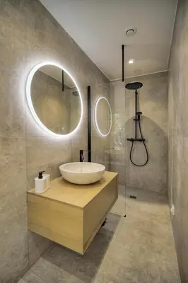 a bathroom with a sink and a mirror at Le Greg - Terrasse - Parking - VCA in Cannes