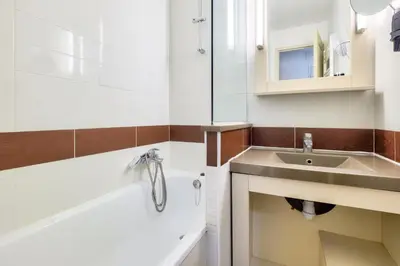 a bathroom with a sink and a bath tub at Résidence Cannes Villa Francia - maeva Home - Appartement 2 pièces 5 personnes - Prestige MAE-2341 in Cannes