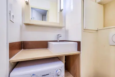 a bathroom with a sink and a toilet at Résidence Cannes Villa Francia - maeva Home - Appartement 2 pièces 5 personnes - Prestige MAE-2341 in Cannes