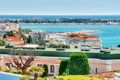 a view of the city and the water at Résidence Cannes Villa Francia - maeva Home - Appartement 2 pièces 4 personnes - Sélection MAE-2351 in Cannes