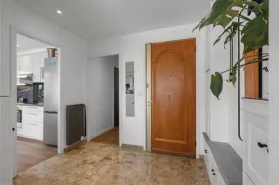 a hallway with a wooden door in a kitchen at Cannes, Sea View, Beach Access, 3-Bedroom Apartment, 100 m2, 3 Bathrooms, Sleeps 6, 100 meters from Beach in Cannes