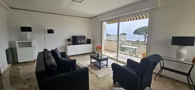 a living room with two couches and a large window at Cannes, Sea View, Beach Access, 3-Bedroom Apartment, 100 m2, 3 Bathrooms, Sleeps 6, 100 meters from Beach in Cannes
