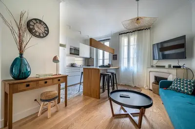a living room with a blue couch and a table at B016 - Beautiful apt For 4 - Cannes center in Cannes