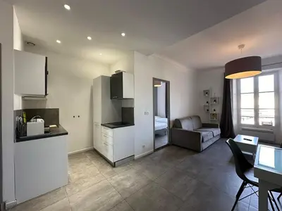 a white bathroom with a sink and a shower at B081 - Bel appartement Cannes - Tassigny in Cannes