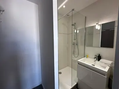 a bedroom with a bed with two towels on it at B081 - Bel appartement Cannes - Tassigny in Cannes