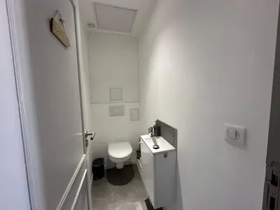 a bedroom with a bed with two white towels on it at B081 - Bel appartement Cannes - Tassigny in Cannes