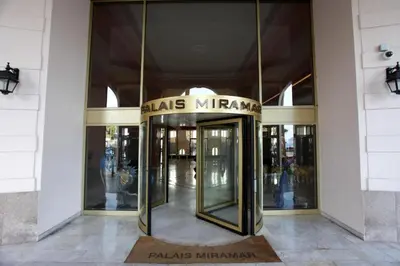 a entrance to a building with a revolving door at LA CROISETTE élégant studio avec balcon et vue mer aperçu in Cannes