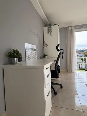 an office with a desk and a chair and a window at Appartement vue panoramique sur Cannes, 100M2 3P in Cannes