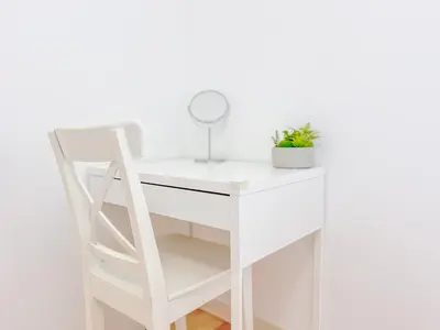 a white desk with a chair and a mirror at Le Cannes Mélodie - Terrasse in Cannes