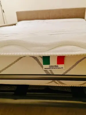 a mattress with a sticker on the top of it at Charmant Studio à 5 minutes des plages in Cannes