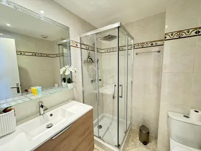 a bathroom with a shower and a sink and a toilet at Studio confortable proche mer deb1890 in Cannes