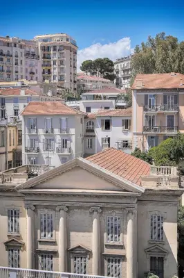 a view of a building in a city with buildings at Le Eve- 350M mer- 600 Palais-VCA in Cannes