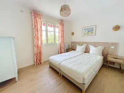 a bedroom with a bed and a window at 63m2 Grande Terrasse, Clim in Cannes