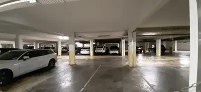 a parking garage with cars parked in it at Le Paradis d'Ella in Cannes