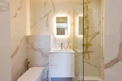 a bathroom with a sink and a shower at Rare luxury 3-Br near the Croisette in Cannes