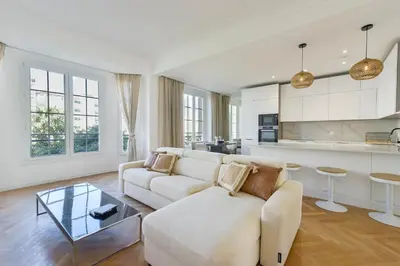 a living room with a couch and a table at Rare luxury 3-Br near the Croisette in Cannes