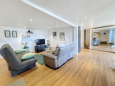 a living room with two couches and a television at Grand 2p Proche Palais - Boulevard Delaup Cannes in Cannes
