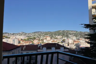 a view of a city from a balcony at Appartement à 10min à pied Palais Festivals in Cannes