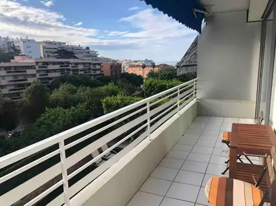 a balcony with a view of a city at Appartement 3 pièce à Cannes in Cannes