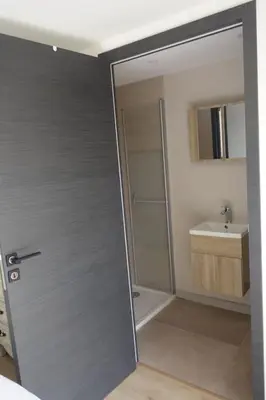 a bathroom with a shower and a sink at Studio Toit terrasse - Vue mer Cannes in Le Cannet