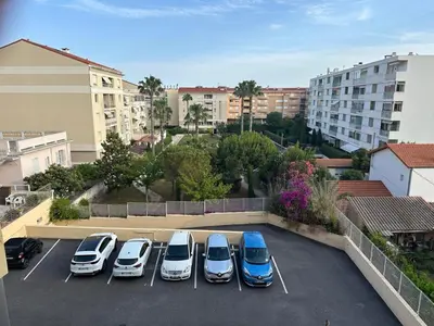a group of cars parked in a parking lot at Super Apartment, Parking, Terrace, Lift, WIFI, Palm Beach, Cannes in Cannes