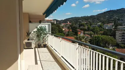 a balcony with a view of a city at Beau 2 pièces centre de Cannes idéal congres et vacances in Cannes