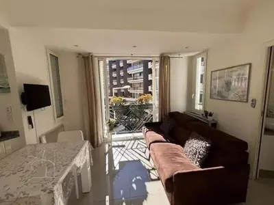 a living room with a couch and a table at Elegant studio a 50m de la Croisette et ses plages - Ada Serenity Beach in Cannes