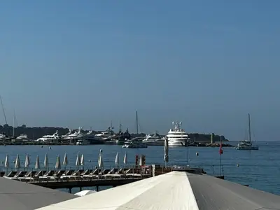 a dock with a bunch of boats in the water at Elegant studio a 50m de la Croisette et ses plages - Ada Serenity Beach in Cannes