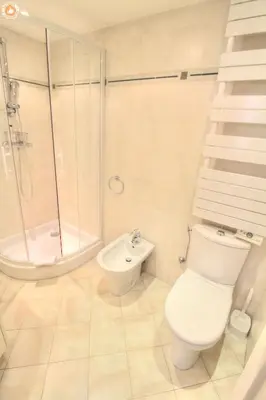 a bathroom with a toilet and a shower and a sink at ALC - FONT3 - 10 min PALAIS in Cannes