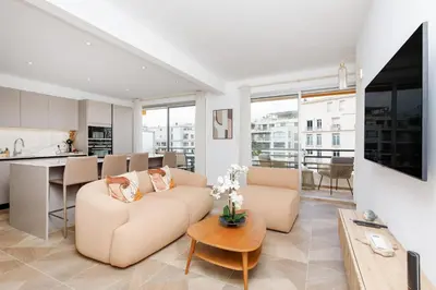 a living room with a couch and a table at Carlton area lux 2 beds 2 baths in Cannes