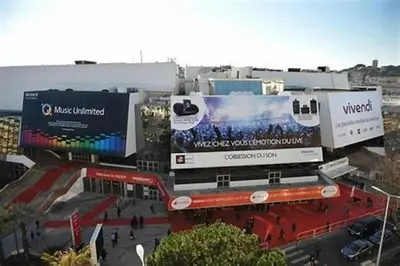 a large building with signs on the side of it at Studio Cannes Carré d'Or in Cannes