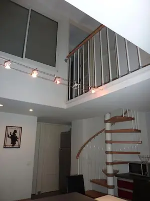 a staircase in a house with lights on it at Le Grenade - Spacieux 2 chambres Cannes centre 5min à pied in Cannes