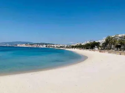 a view of the beach in positano at Appartement 2 pièces avec un jardin privatif in Cannes