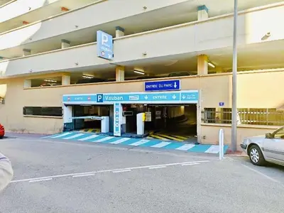 a parking garage with a car parked in front of it at Le BlueAzur - Proche Palais centre Cannes in Cannes